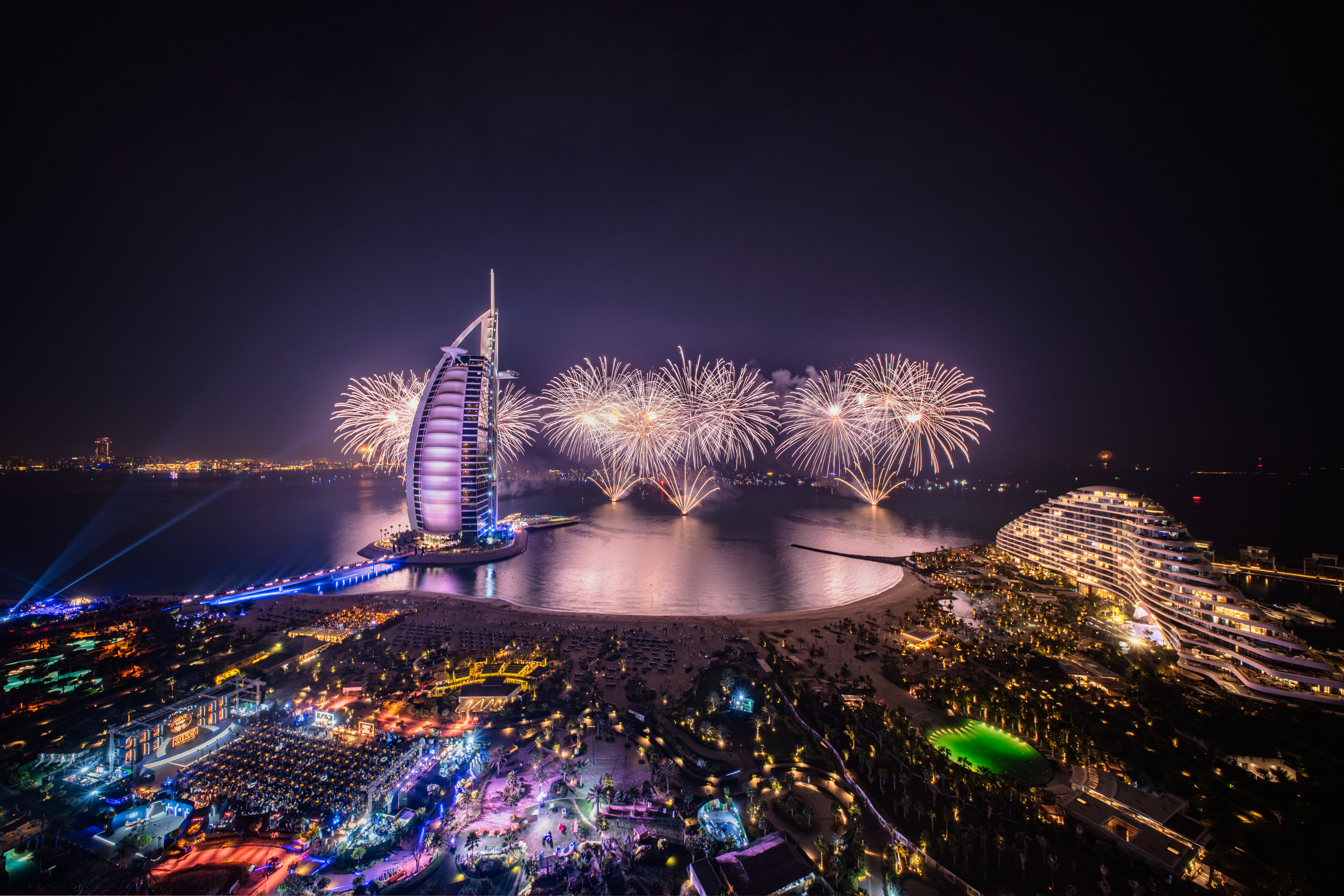 Dubai illuminated skyline at twilight